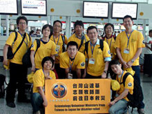 Proud to help: the Taiwanese Volunteer Ministers at Kaohsiung airport before taking off for the four-hour flight to Tokyo.