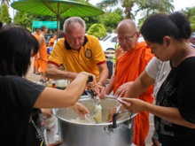 Thai Volunteer Ministers help prepare food boxes for distribution to those stranded by floodwaters.
