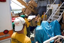 Volunteer Ministers arrange delivery of supplies and other aid materials, including the “Lifeboat for Haiti,” which transported over 100 tons of supplies from the US to Haiti.
