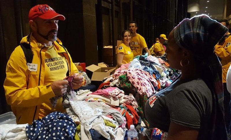 Scientology Volunteer Ministers helping people displaced by Hurricane Harvey at Houston’s Lakewood Church